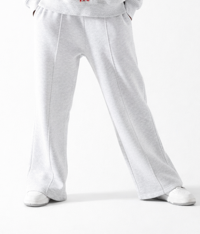Gray sweatpants worn by a person on a white background Main image