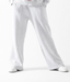 Gray sweatpants worn by a person on a white background